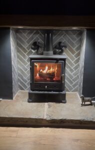 Log burning stove fueled by Premier Logs kiln dried, Ready to Burn, hardwood logs